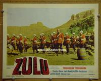 E185 ZULU lobby card #2 '64 cool cast portrait!