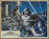 h447 KING KONG movie lobby card #1 '76 art of Kong destroying city!