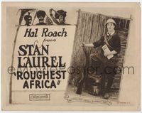 2v657 ROUGHEST AFRICA TC '23 great image of explorer Stan Laurel, with cartoon art of natives!