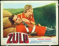 3b716 ZULU movie lobby card '64 great close image of Michael Caine comforting wounded Stanley Baker!