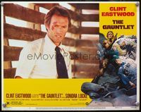 4b410 GAUNTLET movie lobby card #2 '77 close up of Clint Eastwood all beat up, Frazetta border art!