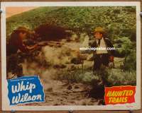 4b472 HAUNTED TRAILS movie lobby card '49 cool image of Whip Wilson in gunfight!