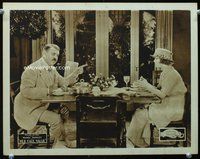 4b481 HER FACE VALUE movie lobby card '21 pretty Wanda Hawley is lectured while eating at table!