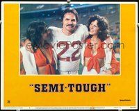 4b778 SEMI-TOUGH lobby card #4 '77 great image of football player Burt Reynolds w/cheerleaders!