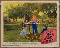 4b798 SING ME A SONG OF TEXAS lobby card '45 Tom Tyler & 'Big Boy' Williams fall for Rosemary Lane!