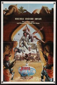 7k338 JEWEL OF THE NILE int'l 1sh '85 great art of Michael Douglas, Kathleen Turner & Danny DeVito!