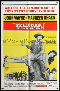 7k449 McLINTOCK 1sh '63 best image of John Wayne giving Maureen O'Hara a spanking!