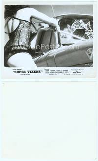 9y450 SUPER VIXENS 8x10 still '75 Russ Meyer, wild c/u of barely-dressed girl smashing car window!