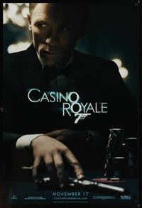 1w144 CASINO ROYALE teaser DS 1sh '06 Daniel Craig as James Bond sitting at poker table w/gun!