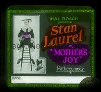 3h182 MOTHER'S JOY glass slide '23 wacky art of Stan Laurel in child's outfit holding toy!