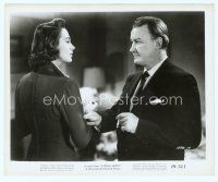 6a255 ILLEGAL ENTRY 8x10 still '49 smoking Tom Tully grabs pretty Marta Toren by the arm!