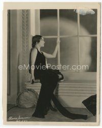 7f178 GLORIA SWANSON 8x10 key book still '30s seated portrait wearing black dress in window sill!