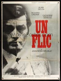 8c130 DIRTY MONEY French 1p '72 Jean-Pierre Melville's Un Flic, close up of smoking Alain Delon!