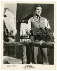 7t299 GEORGE MONTGOMERY signed 8x10 still '57 holding suitcase from Gun Duel in Durango!