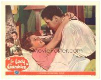 4d559 LADY GAMBLES LC #7 '49 romantic c/u of compulsive gambler Barbara Stanwyck & Stephen Mcnally