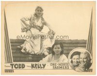 8g862 ONE-HORSE FARMERS LC '34 close up of sexy Thelma Todd with Patsy Kelly sitting on rooftop!