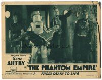 8g344 PHANTOM EMPIRE chapter 7 LC '35 unconscious Gene Autry carried by funky Muranian robot!