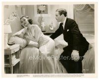 1h566 IT'S LOVE I'M AFTER 8x10 still '37 Patric Knowles looks at Olivia de Havilland on bed!