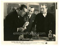 1h688 MURDER OVER NEW YORK 8x10 still '40 c/u of Sidney Toler as Charlie Chan examining a clue!