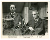 1h710 NIGHT KEY 8x10 still R54 Boris Karloff eyes the newspaper Hobart Cavanaugh is reading!