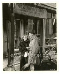 1h726 OUTCAST deluxe 7.75x9.5 still '37 c/u of doctor Warren William staring at pretty Karen Morley