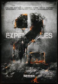 2b298 EXPENDABLES 2 teaser DS 1sh '12 image of tough-guy Sylvester Stallone in blown-up building!