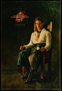 3p394 HUNGER GAMES: CATCHING FIRE teaser DS 1sh '13 Sam Claflin as Finnick seated in chair!