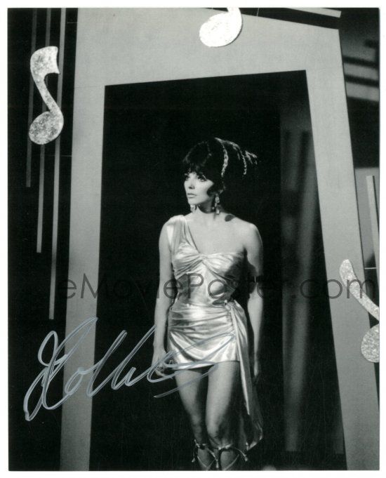 : 1a777 JOAN COLLINS signed 8x10 REPRO still '80s image of  the sexy English star as Siren on Batman!