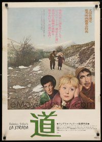 1j231 LA STRADA Japanese R74 Federico Fellini, Anthony Quinn walking with Giulietta Masina!