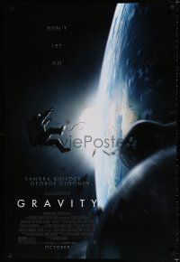 1z333 GRAVITY October advance DS 1sh '13 Sandra Bullock, George Clooney, adrift in space!