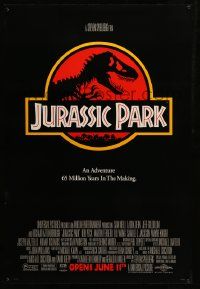 9c465 JURASSIC PARK advance 1sh '93 Steven Spielberg, classic logo with T-Rex over red background