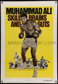 9f224 SKILL BRAINS & GUTS linen 1sh '75 best image of Muhammad Ali in boxing trunks & gloves raised!