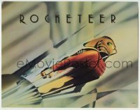 4s382 ROCKETEER TC '91 Disney, cool John Mattos art of Bill Campbell in full costume!