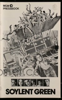 8d403 SOYLENT GREEN pressbook 1973 art of Charlton Heston trying to escape riot control by Solie!