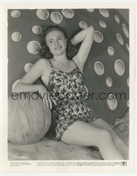 1h494 JOAN LESLIE 8x10.25 still 1942 relaxing at the beach before making Yankee Doodle Dandy!