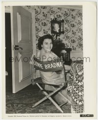 1h699 OLYMPE BRADNA 8.25x10 still 1938 smiling because she's in her new personalized chair on set!