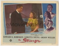 3c865 STRANGER LC 1946 close up of ex-Nazi Orson Welles grabbing scared Loretta Young!