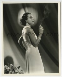 3m341 DOLORES DEL RIO 8x10.25 still 1936 smoking & modeling a daring decolletage by Elmer Fryer!