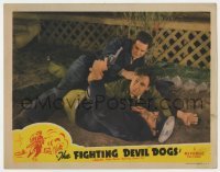 3z534 FIGHTING DEVIL DOGS LC 1944 close up of Lee Powell on ground fighting with two bad guys!