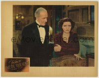 3z570 GIVE ME YOUR HEART LC 1936 close up of worried Kay Francis & Henry Stephenson in tuxedo!