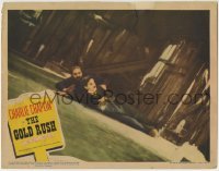 3z577 GOLD RUSH LC R1942 Charlie Chaplin & Mack Swain sliding on cabin floor, comedy classic!