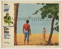 4p270 DR. NO LC #6 1962 Sean Connery as James Bond stares at sexy Ursula Andress across beach!