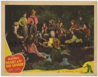 4p399 HEART OF THE RIO GRANDE LC 1942 Gene Autry with lasso smiling at others around campfire!