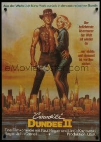 5y565 CROCODILE DUNDEE II East German 23x32 1990 great art of Paul Hogan & Kozlowski over NY by Goozee!