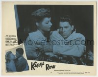 7c638 KINGS ROW LC #6 R1956 Ann Sheridan holds Ronald Reagan who asks Where's the rest of me!