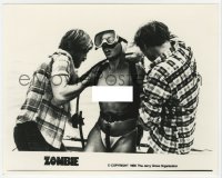 7h997 ZOMBIE 8x10 still 1980 two men on boat help sexy topless diver out of her scuba gear!