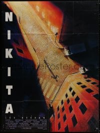 9j875 LA FEMME NIKITA French 1p 1990 Luc Besson, cool overhead art of Anne Parillaud in alley!