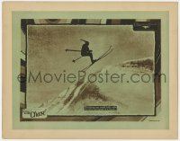 9y346 CHASE LC 1924 cool image of guy on skis swooping over small hills with the grace of a hawk!