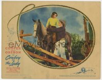 9y364 COWBOY & THE LADY LC 1938 Gary Cooper helps pretty Merle Oberon on horseback!