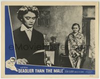 9y387 DEADLIER THAN THE MALE LC 1956 woman in robe staring at Daniele Delorme, Julien Duvivier!